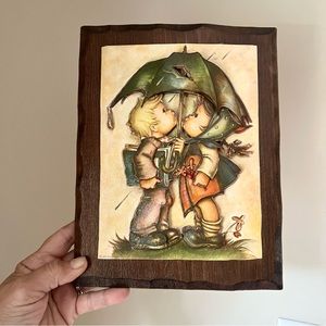 Hummel 3D print on wood “Honey Buns under the Umbrella”